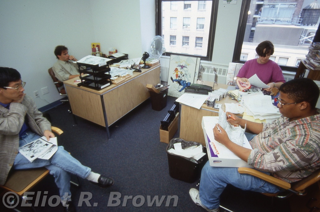 To the rear: Editor Bob Harris and Assistant Lisa Patrick. The youngster to image left is intern, Sam Yoshiba of Kodansha a Japanese manga magazine! The other fellow is a more conventional intern, alas, unknown.